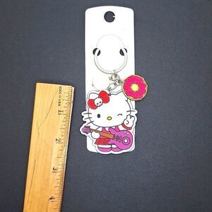 Guitar Hello Kitty winking dangle smiley flower sunshine acrylic accesso…